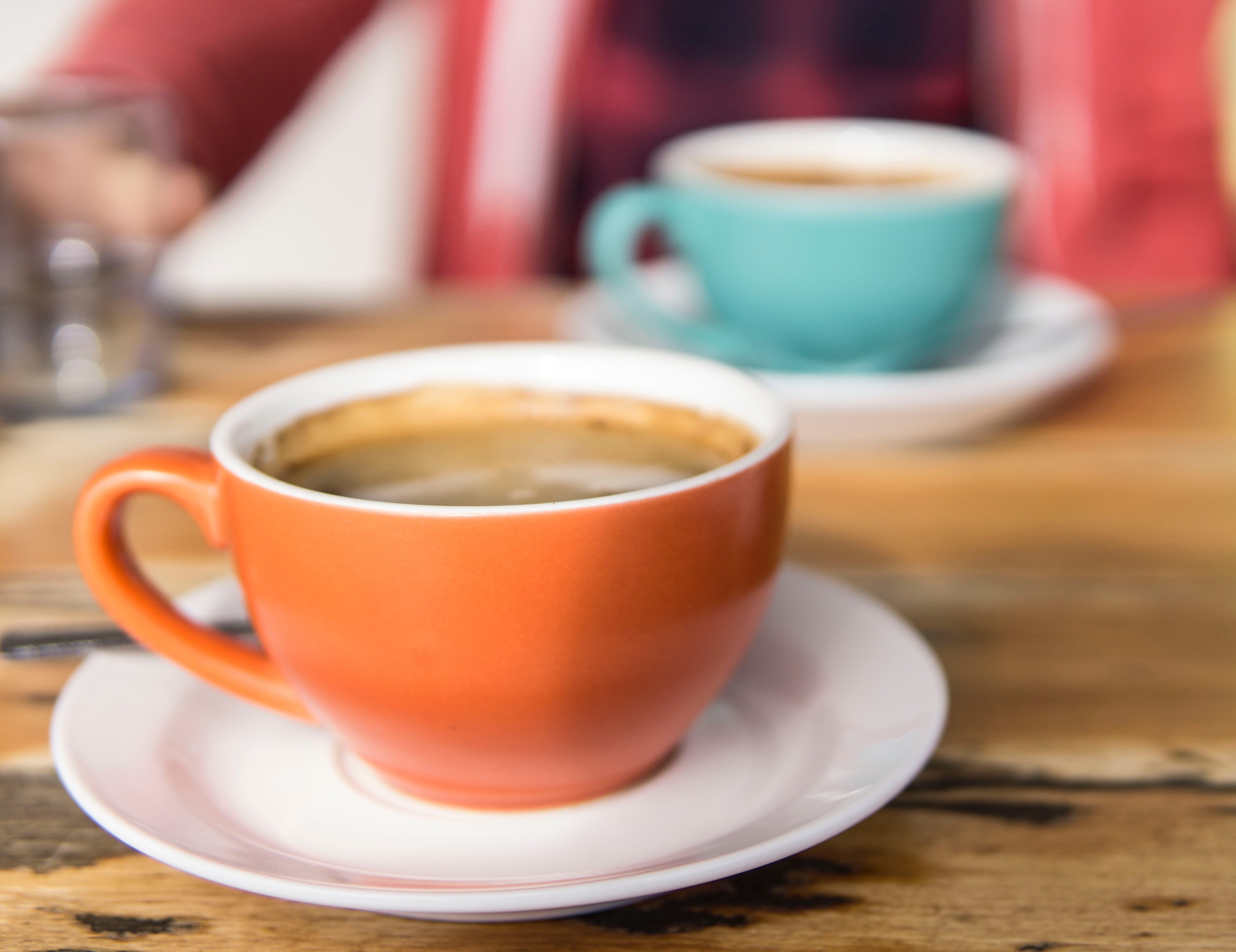 Orange and Teal Coffee Cups