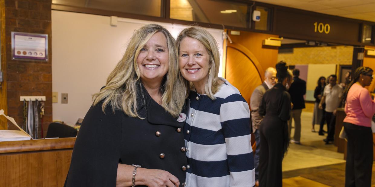 Two smiling people pose for a photo during the 2025 Annual Gathering.