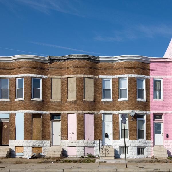 Row of houses, one pink, Baltimore, Maryland